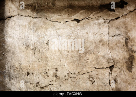 Vieux mur de béton avec texture fissuré. Résumé fond. Banque D'Images