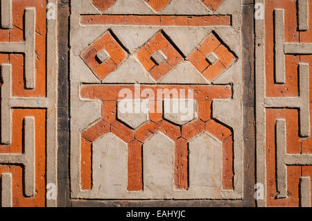 Les motifs et les symboles antiques sur un mur à Gyeongbokgung Palace à Séoul, Corée du Sud. Banque D'Images