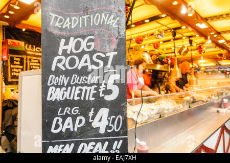 Belfast, Irlande Northerm. 15 novembre, 2014. Rôti de porc à la vente au marché continental annuel dans le parc de Belfast City Hall Crédit : Stephen Barnes/Alamy Live News Banque D'Images