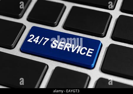 Service 24 heures sur 24, bouton bleu sur le clavier, concept d'entreprise Banque D'Images