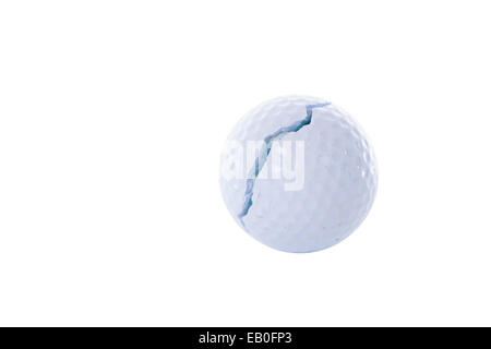 Balle de golf blanc craquelé, isolated on white Banque D'Images