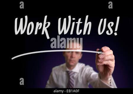 Un homme d'écrit Travailler avec nous sur un écran. Concept d'emploi Banque D'Images