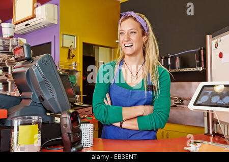 Portrait woman working in cafe Banque D'Images