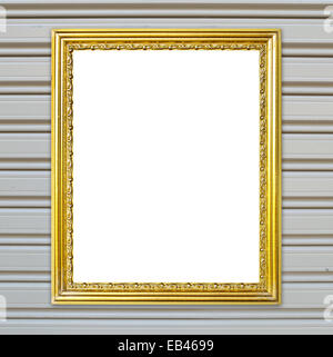 Cadre doré vierge sur metal wall background Banque D'Images
