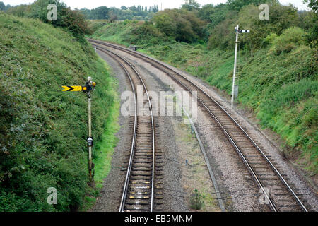 Les signaux de chemin de fer menant à l'écart de l'Reedham pont tournant, Norfolk Banque D'Images