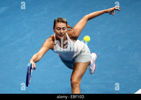 Pasay City, Philippines. 29 Nov, 2014. Maria Sharapova de la Manille Mavericks équipe retourne la balle durant son match contre femmes 23 11 de l'équipe de l'Indien Aces Tennis International Premier League à Pasay City, au sud de Manille, Philippines, le 29 novembre 2014. Ivanovic a gagné 6-3. © Rouelle Umali/Xinhua/Alamy Live News Banque D'Images