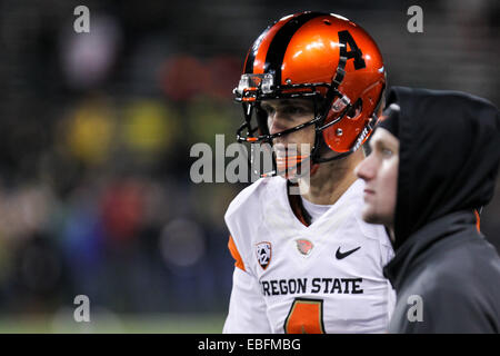 Le 29 novembre 2014 - SEAN MANNION (4) montres les derniers moments du jeu à partir de la touche. L'Université de l'Oregon joue à l'état de l'Oregon de Reser Stadium le 29 novembre 2014. © David Blair/ZUMA/Alamy Fil Live News Banque D'Images