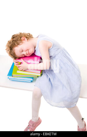 Little girl with books Banque D'Images