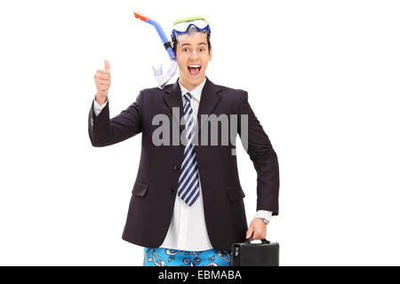 Businessman avec équipement de plongée giving thumb up isolé sur fond blanc Banque D'Images