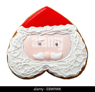 Christmas gingerbread cookie isolé sur fond blanc. La forme du père noël Banque D'Images