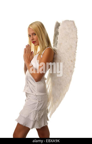 Young attractive ange blond avec des ailes Banque D'Images