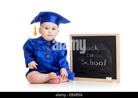 Funny baby dans l'académicien vêtements au tableau Banque D'Images