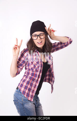 Hipster Cute boy Beanie Hat posing looking at camera Banque D'Images