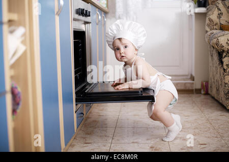 Baby chef cuisine au four food Banque D'Images