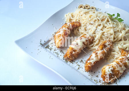 Une assiette de frites avec taquitos Banque D'Images