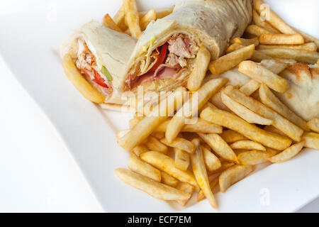 Une assiette de frites avec taquitos Banque D'Images