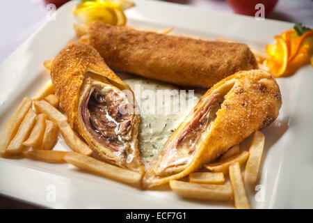 Une assiette de frites avec taquitos Banque D'Images