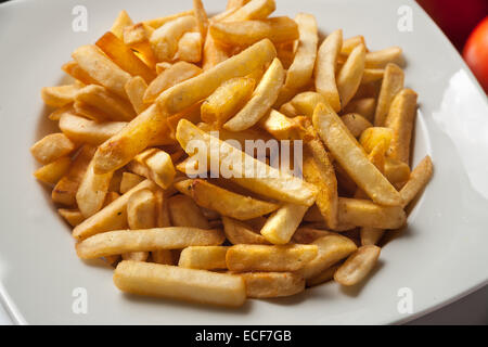 Une assiette de frites avec taquitos Banque D'Images