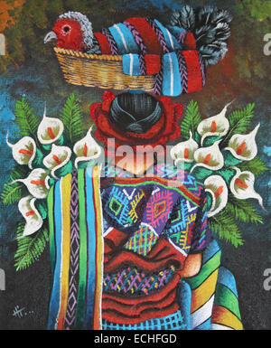 Guatemala la peinture à l'huile montrant femme maya Carrying Basket avec la Turquie sur sa tête Banque D'Images