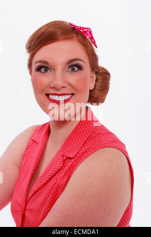 Portrait d'un radiant red-haired woman Banque D'Images