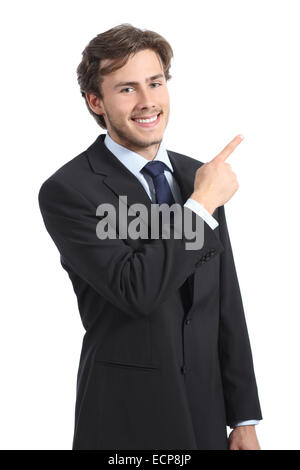 Young happy business man pointing at side isolé sur fond blanc Banque D'Images