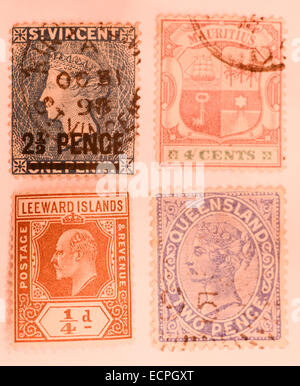 Vieux timbres des anciennes colonies britanniques Banque D'Images