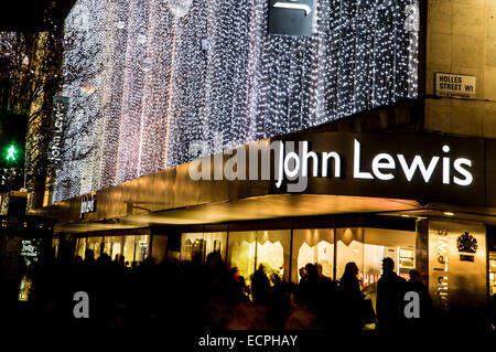 Les lumières de Noël ornent John Lewis Oxford Street Banque D'Images