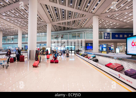 Assurance pickup carousel au hall des arrivées de l'Aéroport International de Pékin, Chine 2014 Banque D'Images