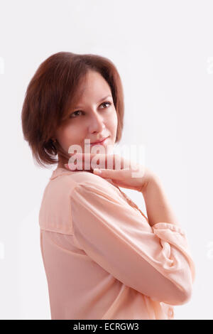 Portrait d'une jeune femme en blouse rose Banque D'Images