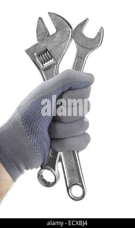 Clés Gloved hand holding isolated on white Banque D'Images