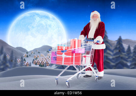 Image composite de santa offrant des cadeaux de panier Banque D'Images