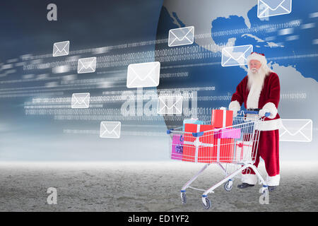 Image composite de santa offrant des cadeaux de panier Banque D'Images