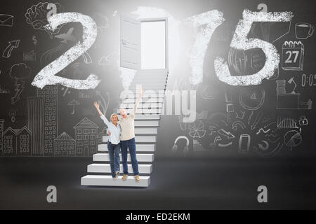 Image composite de mature woman cheering at camera Banque D'Images