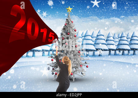 Image composite de businesswoman pulling une chaîne Banque D'Images