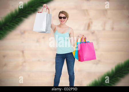Image composite de woman wearing sunglasses Banque D'Images