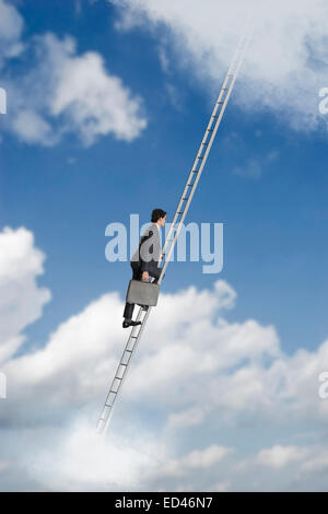 1 Indian businessman climbing on escalier avec porte-documents Banque D'Images