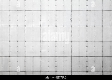 Abstract background photo texture de mur en métal gris avec des carreaux et des rivets Banque D'Images