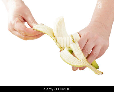 Peler les mains une banane Banque D'Images
