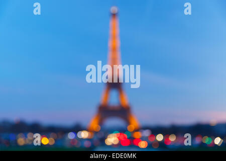 Bokeh photo de la tour Eiffel la nuit scintillante Banque D'Images