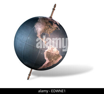 Un vintage world globe incliné et debout sur un axe central sur un fond blanc Banque D'Images