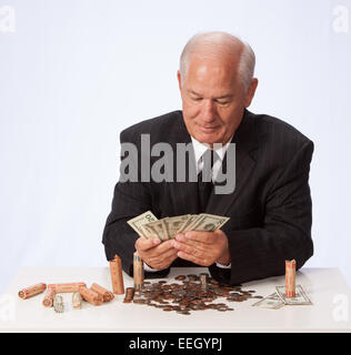 Man in suit compte devise USD Banque D'Images