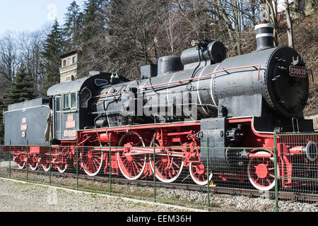 Vintage locomotive à vapeur sur l'affichage de l'ère industrielle Banque D'Images