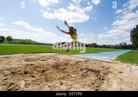 Femme long jump Banque D'Images