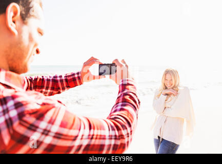 Man taking picture of woman Banque D'Images