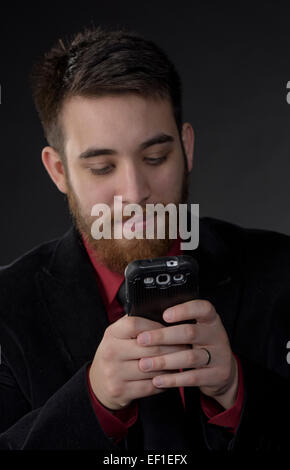Close up barbiche Businessman with Phone Banque D'Images