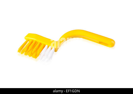 Brosse de nettoyage en plastique jaune sur fond blanc Banque D'Images