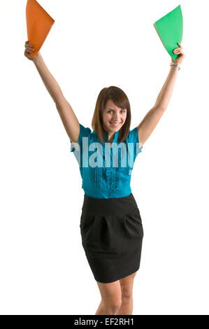 Femme tenant deux chemises au-dessus de sa tête Banque D'Images