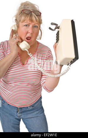 Woman talking on telephone Banque D'Images