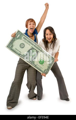 Deux excités women holding une immense dollar bill Banque D'Images