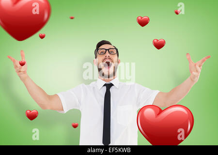 Image composite de geeky young businessman with arms out Banque D'Images